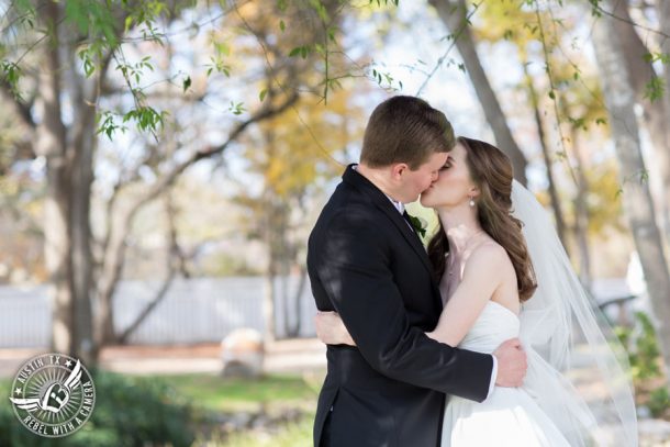 Elegant Casa Blanca on Brushy Creek wedding photos - bride and groom first look kiss